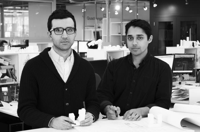 Photo of Nariman and Shamir reviewing 3D digital models 