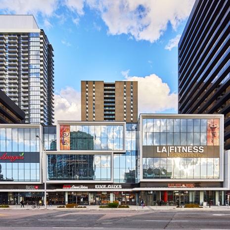 exterior rendering of the Yonge Sheppard Centre, showing the glazed retail section with main tenant LA Fitness, and the residential tower in the background