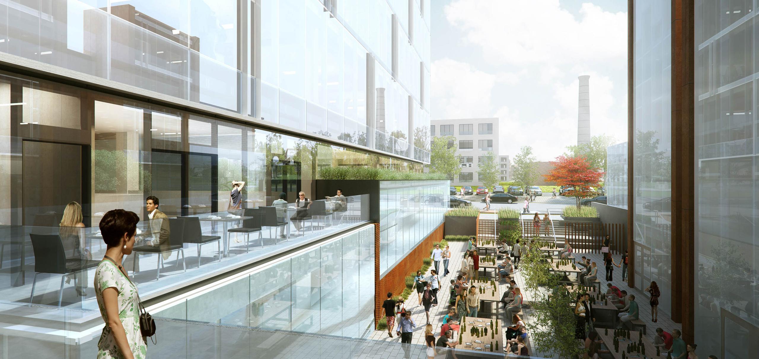Rendering overlooking a busy patio in the shared courtyard of 60 and 80 Atlantic, with historic Liberty Village buildings in the background