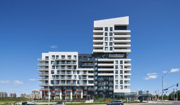 York Condos profile of the building showing white clad balconies