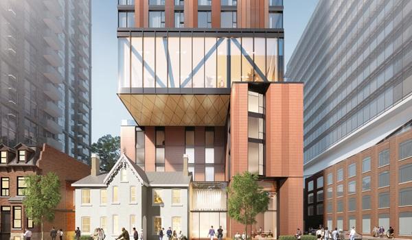 rendering of a high rise condo with red brick like cladding and a podium that cantilevers over restored Victorian houses