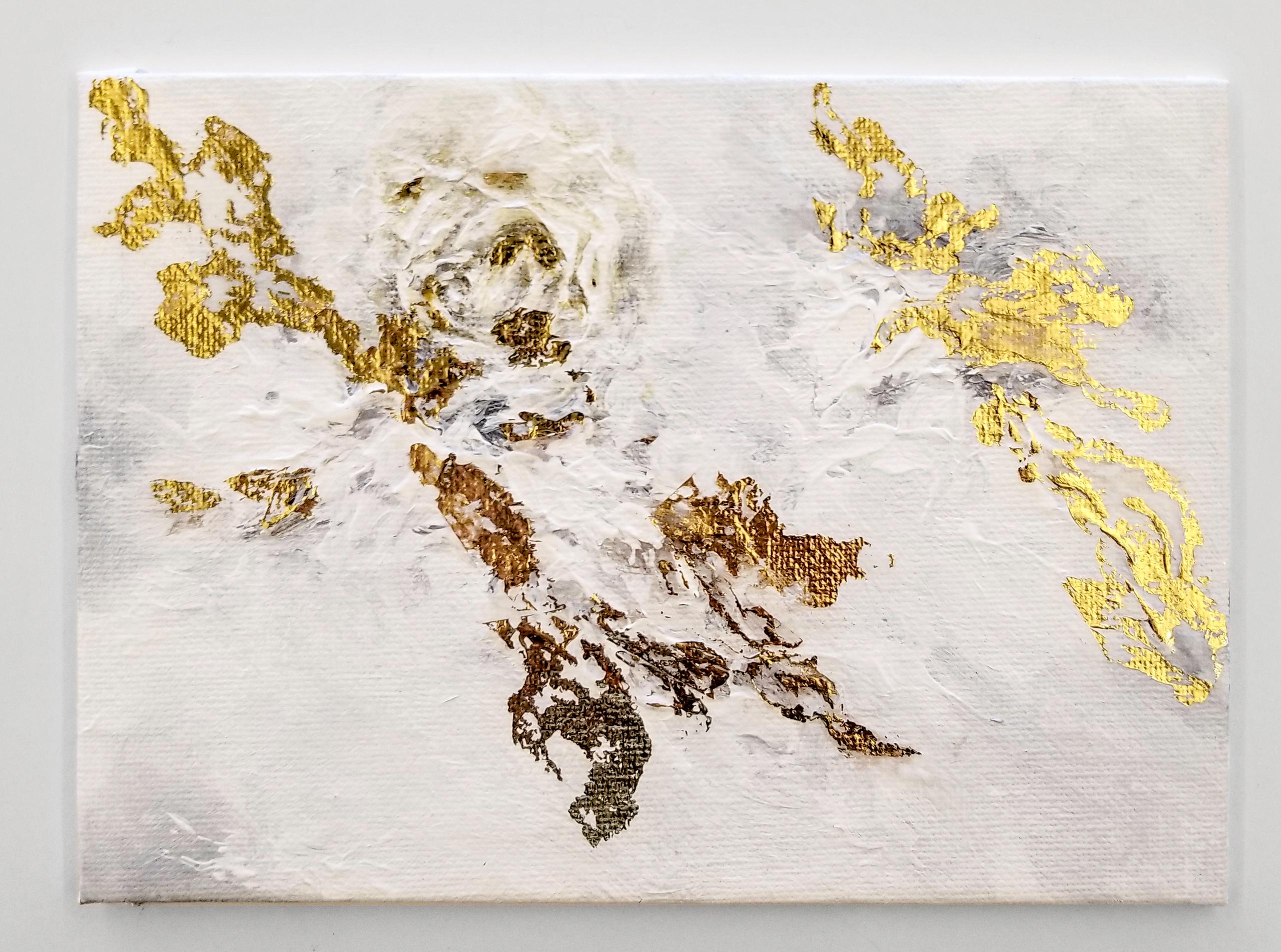 gold leaf on a white and gray canvas painting