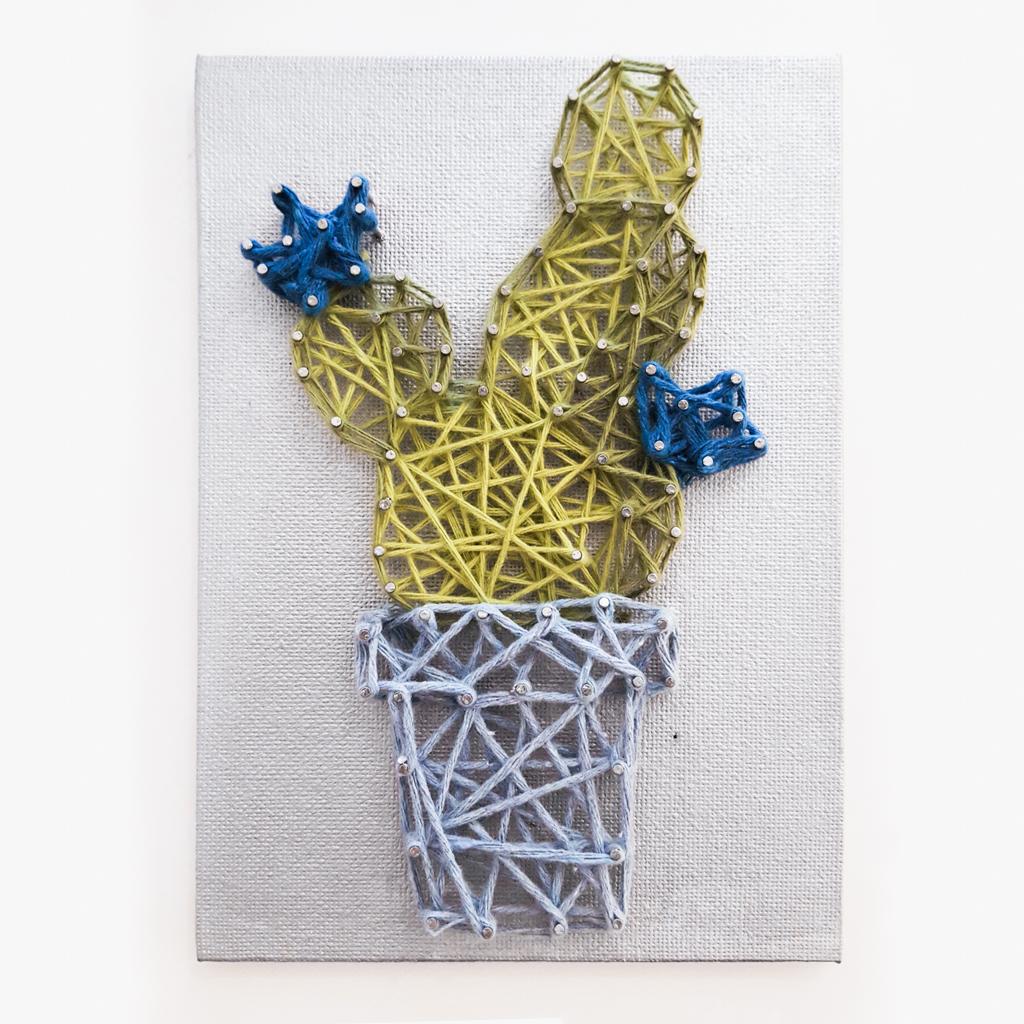 string and nails on canvas depicting a 3D succulent