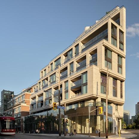 rendering of 1181 Queen Street West, showing its angled corner and large terraces