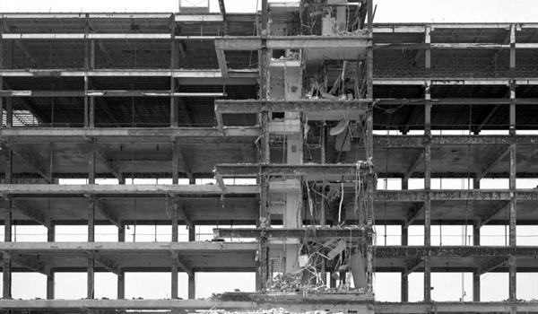 steel and concrete frame of the building after most of it has been demolished
