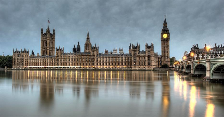 Palace of Westminster and Big Ben in London viewed from the Thames